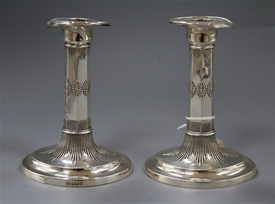 A pair of late Victorian silver candlesticks, George Howson, Sheffield, 1900, 16cm.